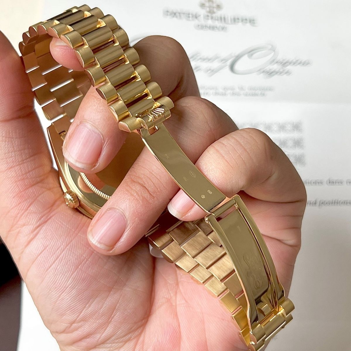 Vàng 750 chiếm 75% trên đồng hồ Rolex fake 1